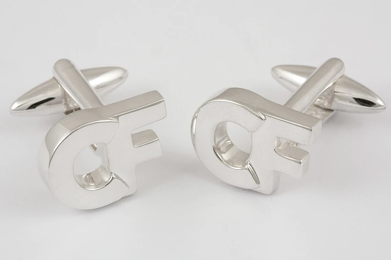 Symbole monogramme Boutons de manchette