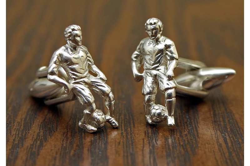 Symbole attaquant Boutons de manchette